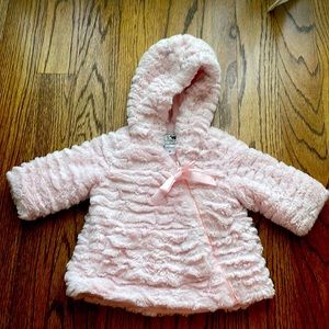Faux fur winter coat for a baby girl